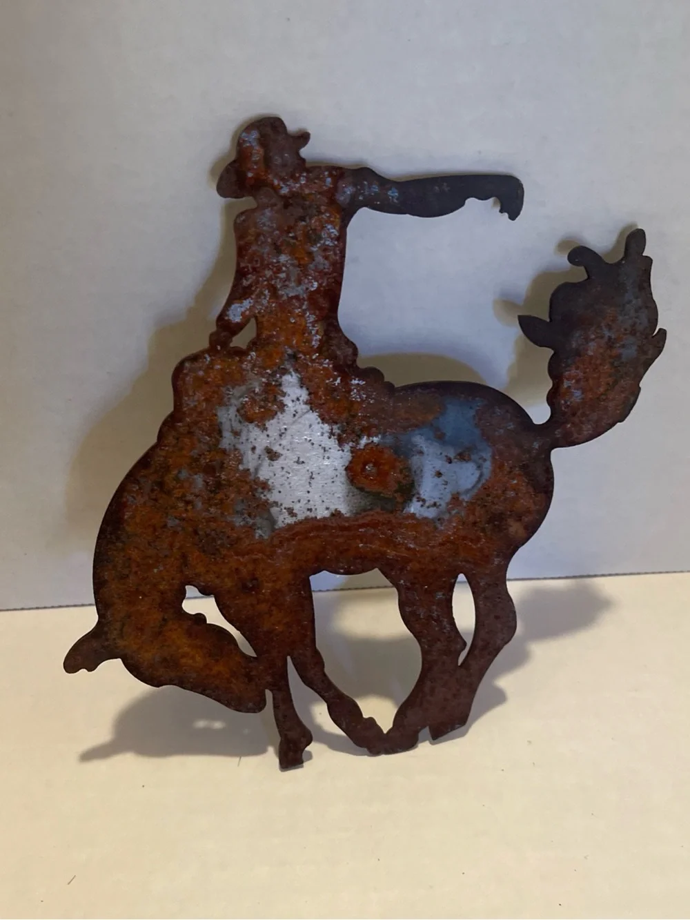 Vintage metal Rust Patina Cowboy Bucking Bronco